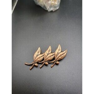 Vintage copper bell leaf brooch